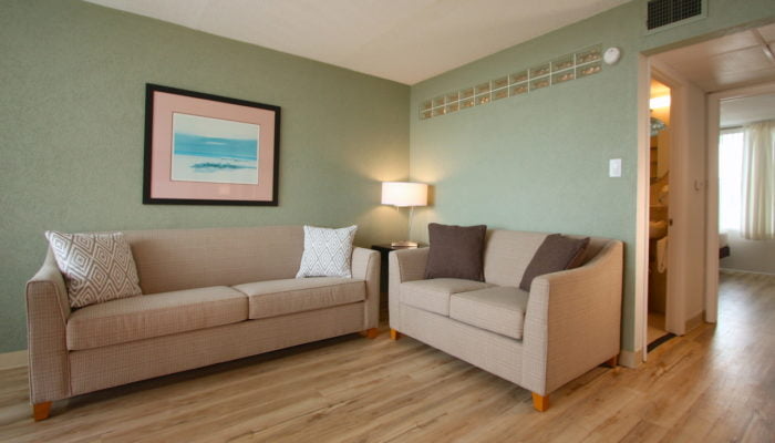 a couches in a room at The Crusader oceanfront resort