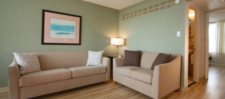 a couches in a room at The Crusader oceanfront resort